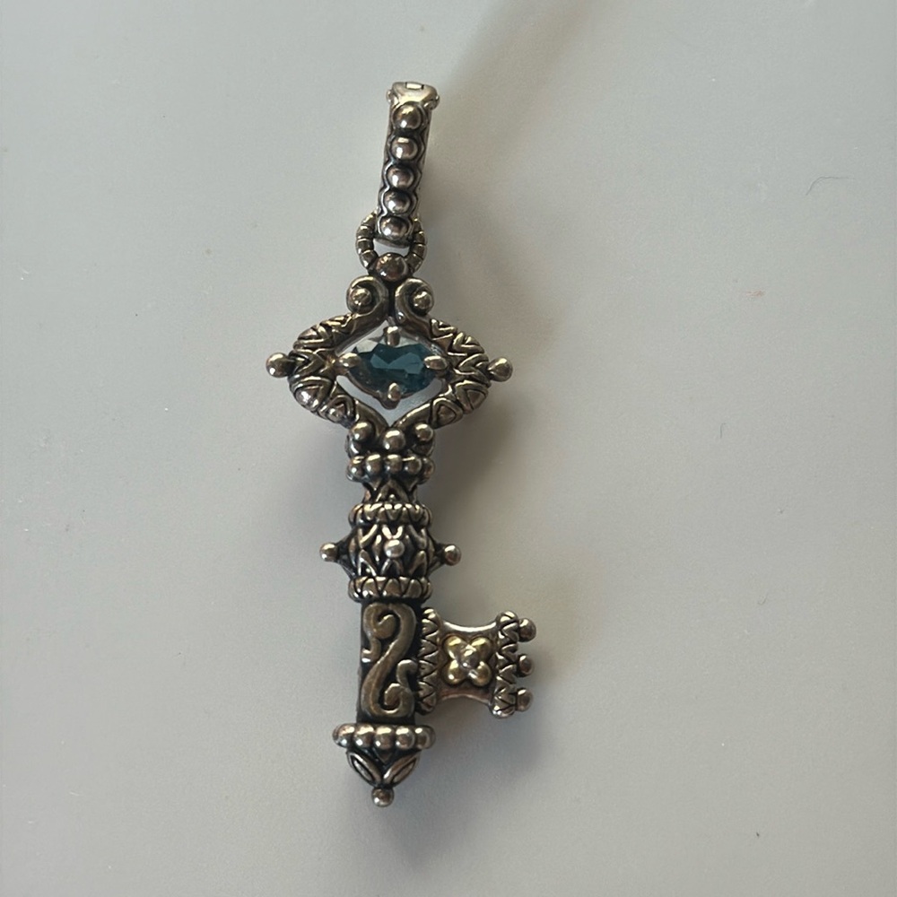 Barbara Bixby Key of Life pendant.  Sterling Silver and 18k gold with blue topaz
